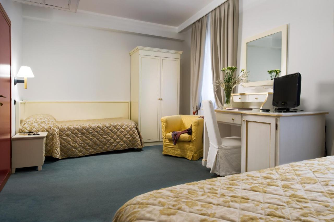 Camera da letto e arredi del Hotel Carlton Capri, Santa Croce, Venezia